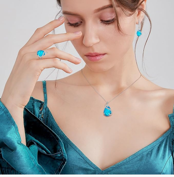 Screenshot 2025-12-02 223106 Ever Faith Women's Jewellery Set Sparkly Cubic Zirconia Teardrop Necklace Earring Bracelet Ring – Sky Blue Silver-Tone