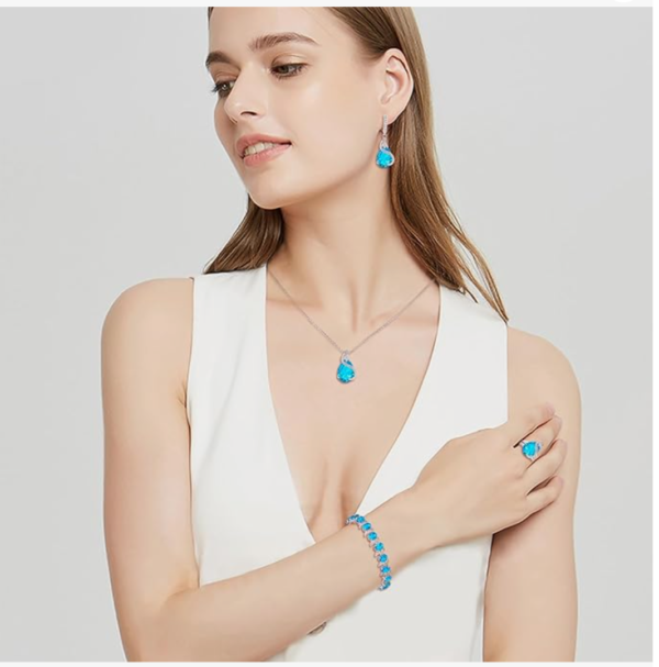 Screenshot 2025-12-02 223118 Ever Faith Women's Jewellery Set Sparkly Cubic Zirconia Teardrop Necklace Earring Bracelet Ring – Sky Blue Silver-Tone